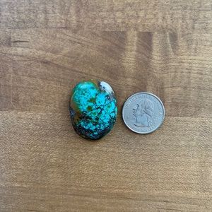 Turquoise Cabochon set in Leather Service